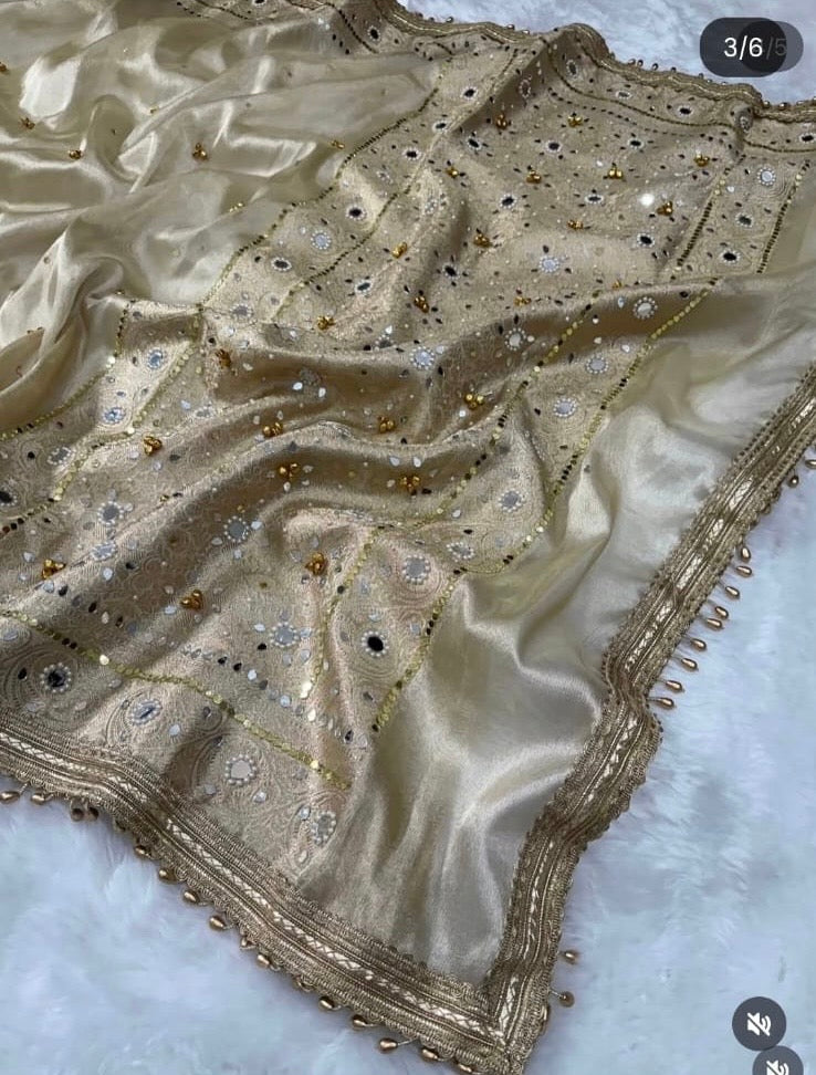 Viral Banarasi Ivory Tissue Silk Saree with Ghungru, Latkans, Laces, Pearls and Mirrors